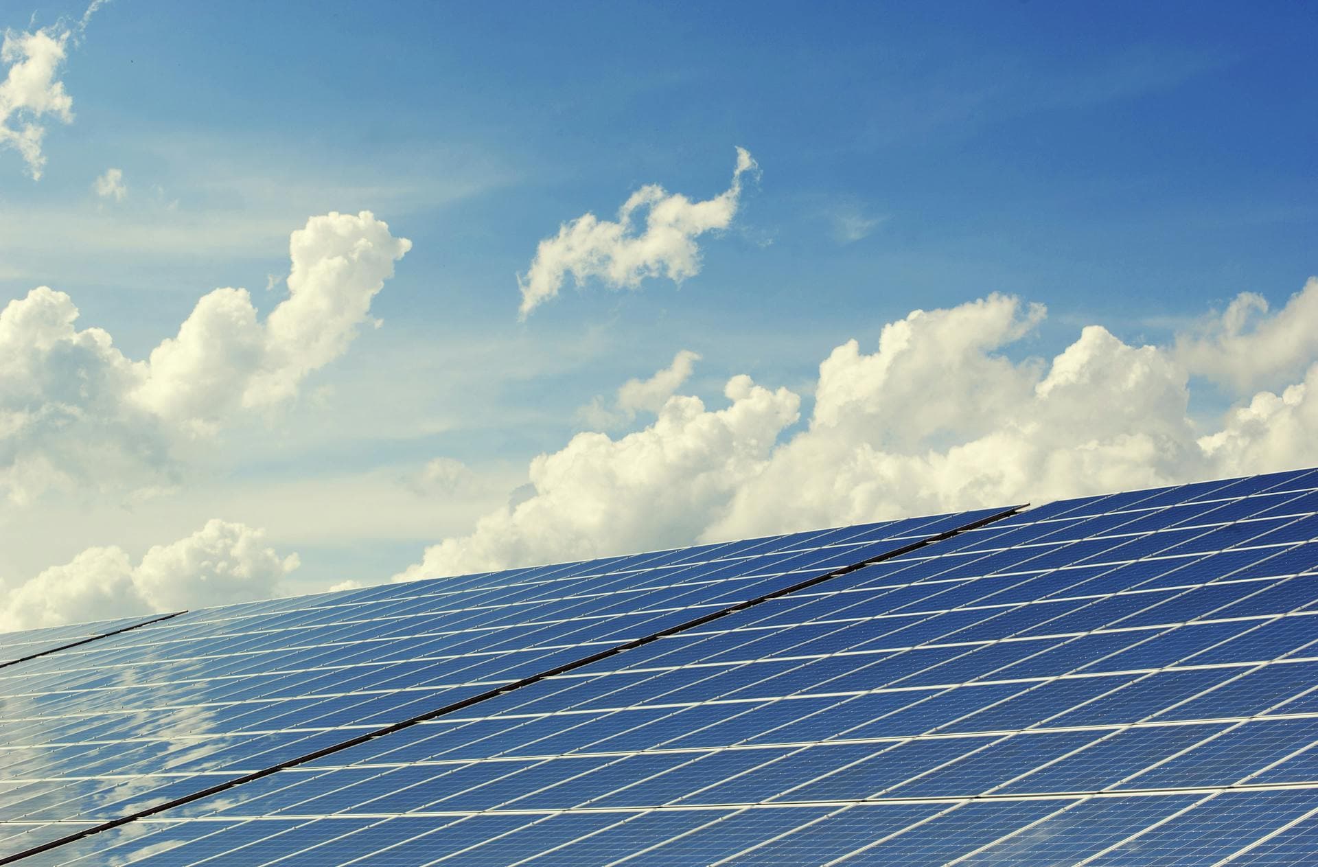 Solar panels against blue sky